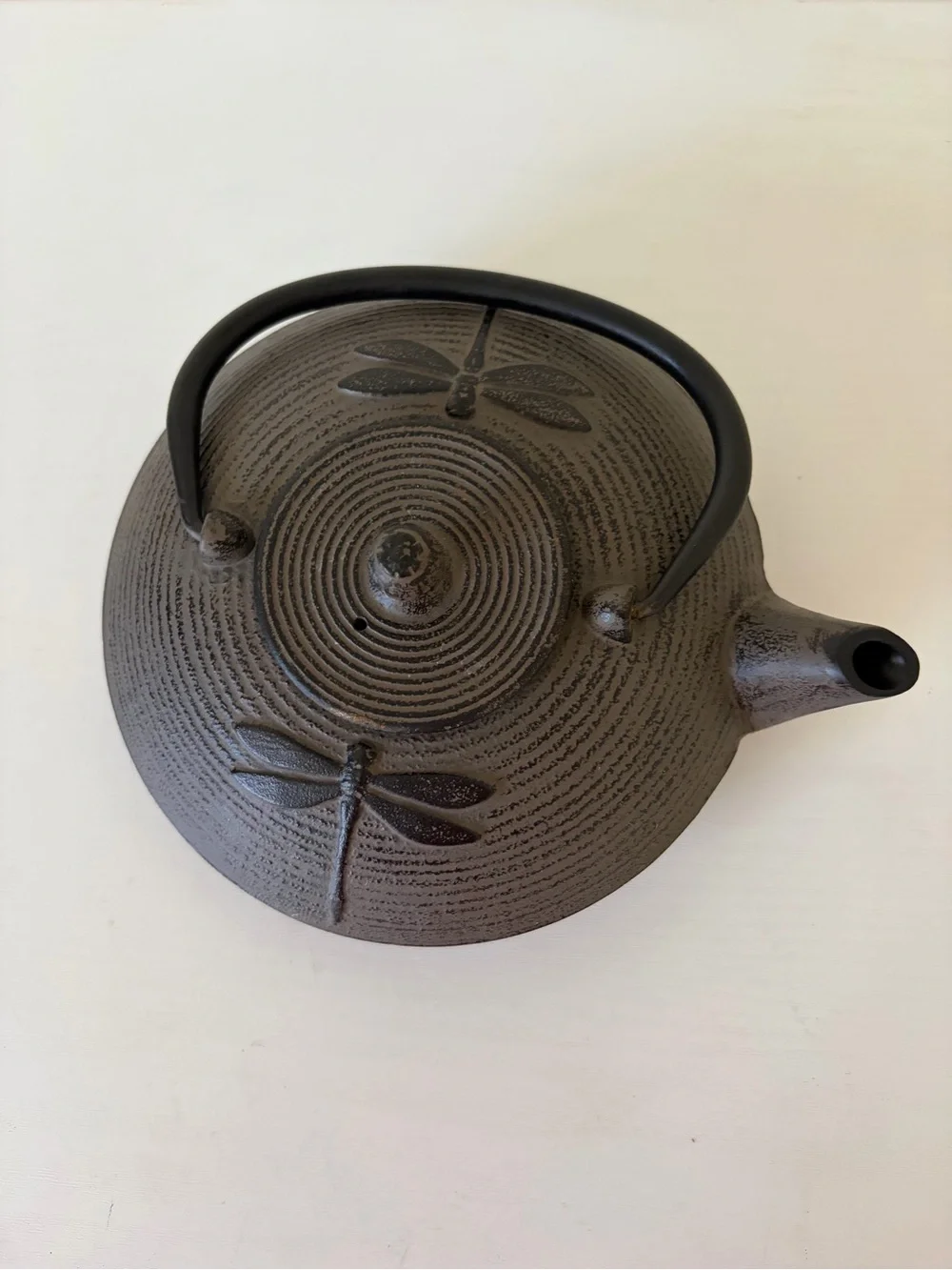 Black Cast Iron Dragonfly Motif Teapot with Curved Handle